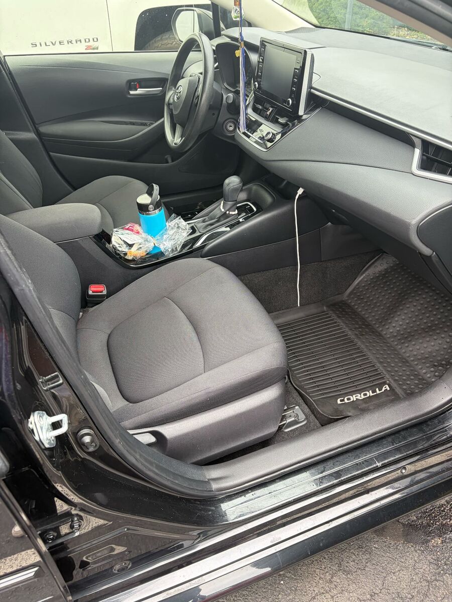 Clean front seat and floor mat after interior detailing